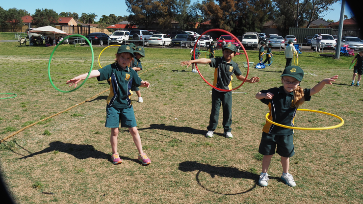 Hula hooping students at the carnival