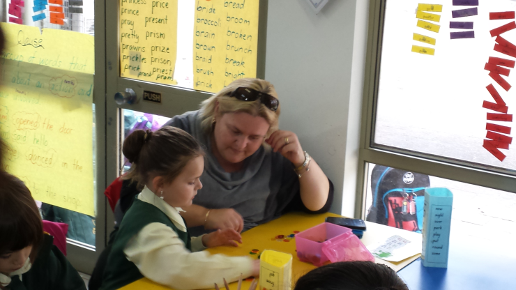 Year 1 Kaitlin Clark reading with her mother.