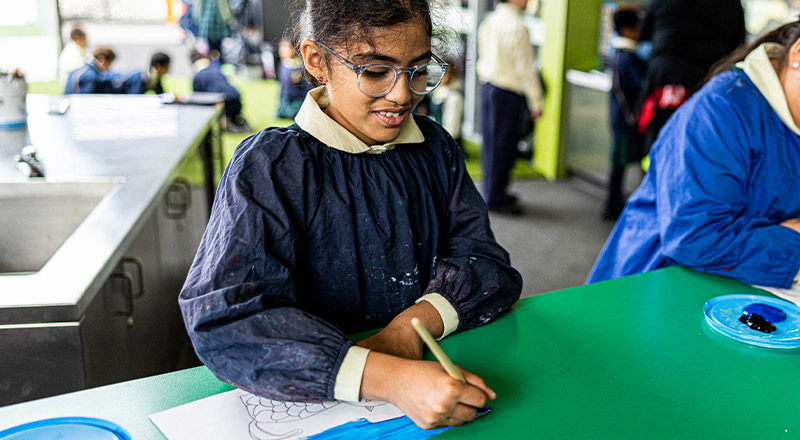 student painting at St Francis of Assisi Catholic Primary School Glendenning