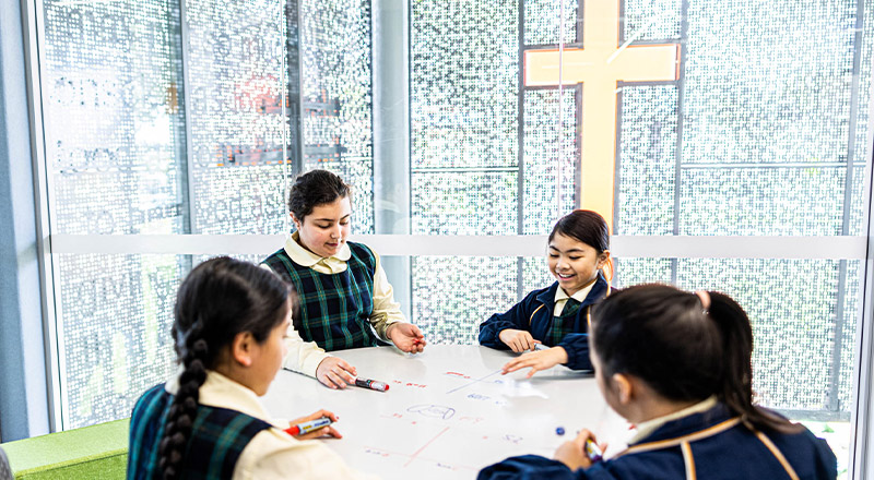 Students at desk at St Francis of Assisi Catholic Primary School Glendenning