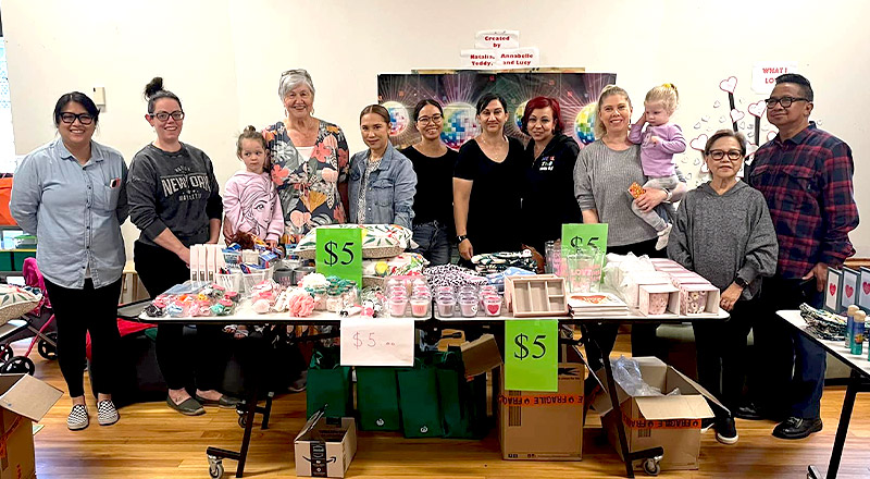 Parents at stalls at St Francis of Assisi Catholic Primary School Glendenning