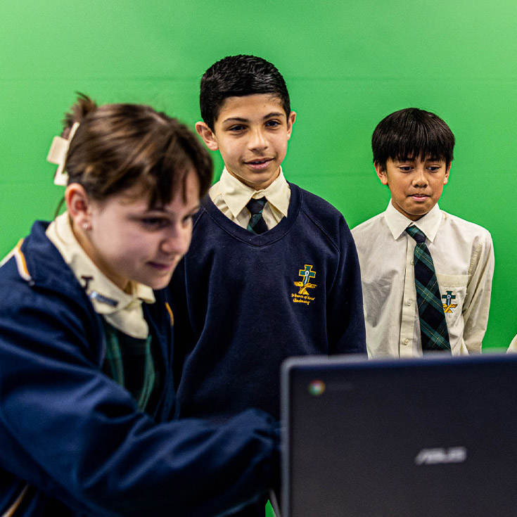Children in front of green screen at St Francis of Assisi Catholic Primary School Glendenning