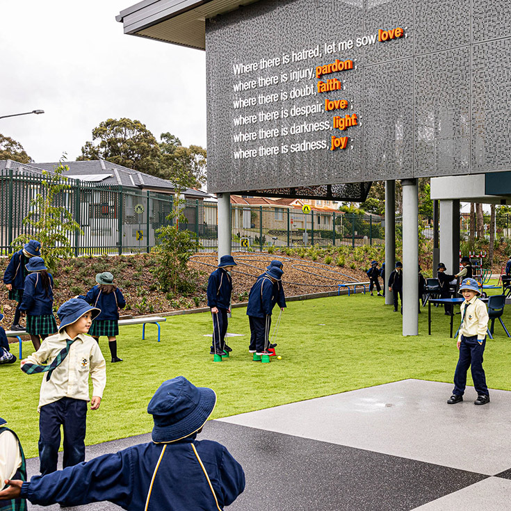 Students on playground at St Francis of Assisi Catholic Primary School Glendenning