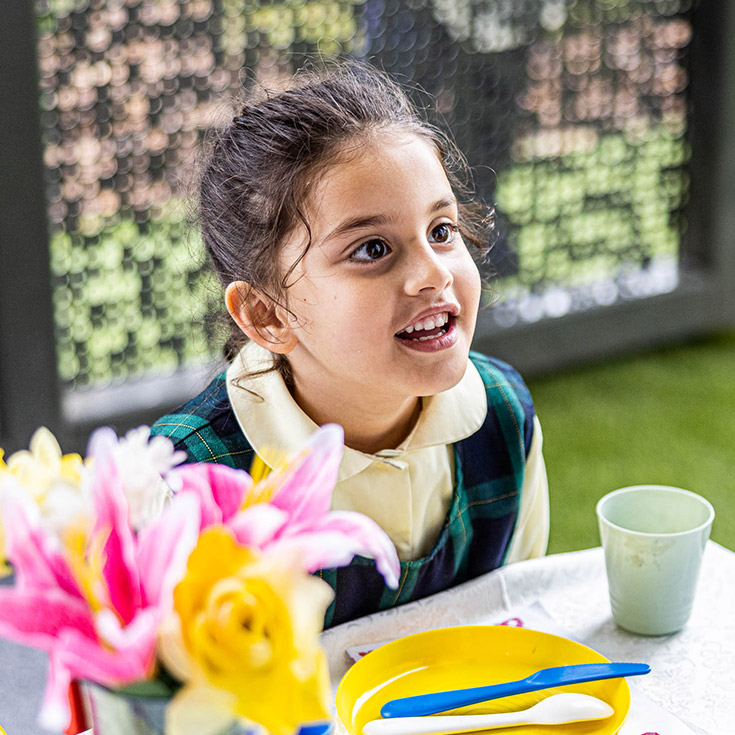 Smiling child at St Francis of Assisi Catholic Primary School Glendenning
